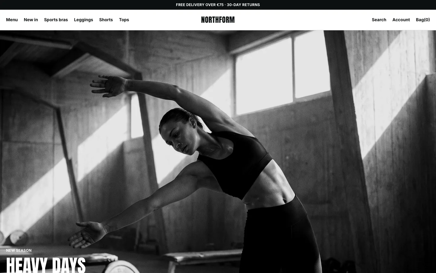 Northform demo: black and white gym campaign, heavy condensed headline Heavy days